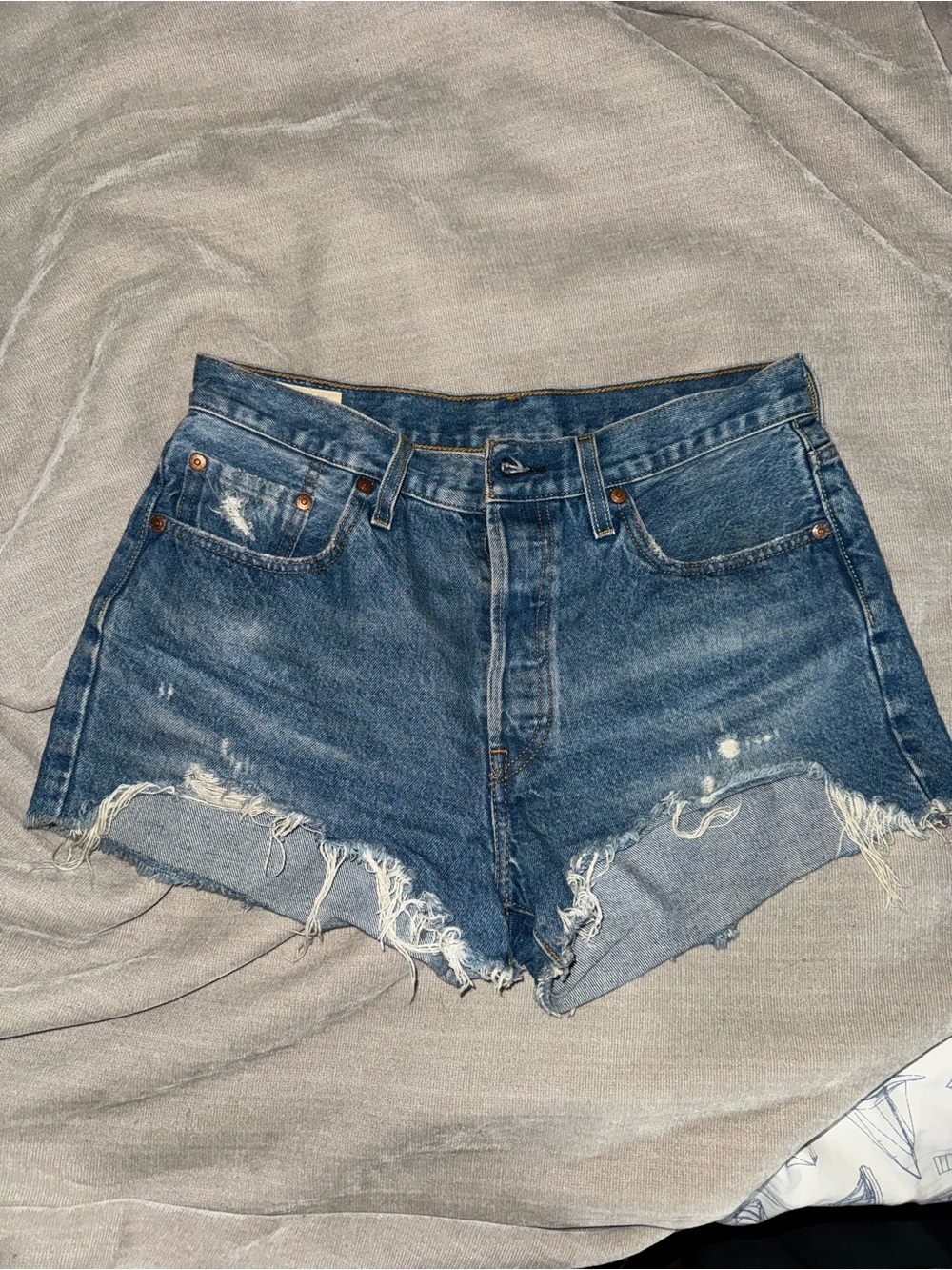 Levi's Distressed Dark Blue Denim Cutoff Shorts